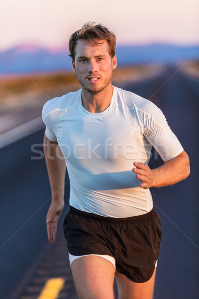 Athlete runner sports man running on summer road Stock photo © Maridav