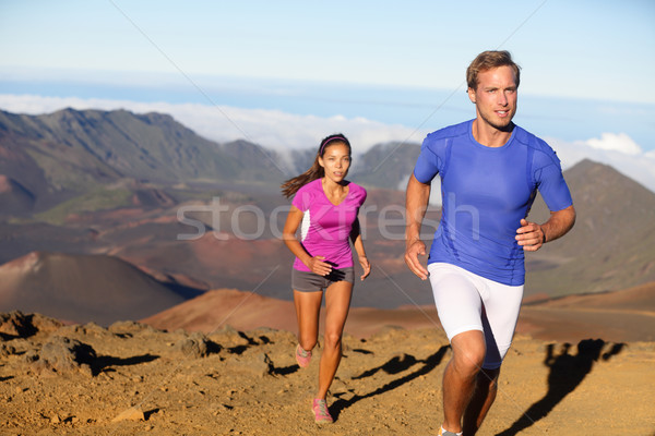 Running sport - trail runners in cross country run Stock photo © Maridav