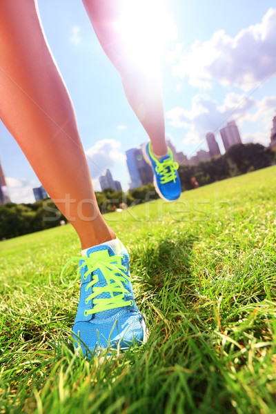 Runner - running shoes on woman athlete Stock photo © Maridav