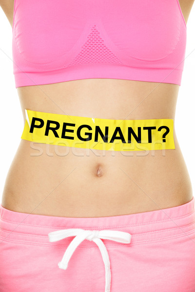 Midsection Of Woman With Pregnant Sign On Belly Stock photo © Maridav