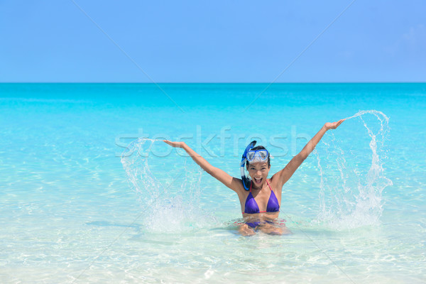 Beach fun holiday woman swimming playing in water Stock photo © Maridav