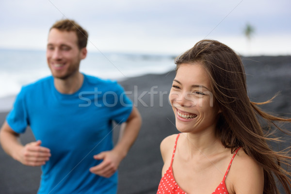 Happy relationship - couple smiling having fun Stock photo © Maridav