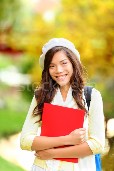 Young woman student in autumn park Stock photo © Maridav