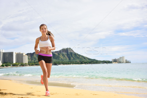 運動 運行 健身女人 慢跑 海灘 運行 商業照片 © Maridav