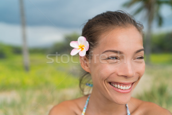 Hawaii Asian girl wearing plumeria flower in hair Stock photo © Maridav