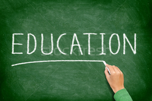 Onderwijs school onderwijs onderwijs Blackboard hand Stockfoto © Maridav