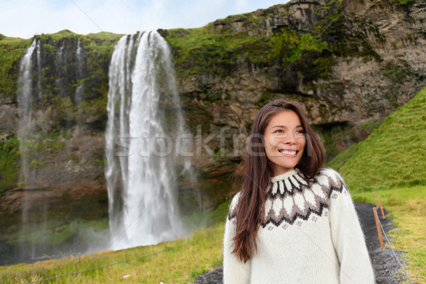 Kobieta sweter wodospad Islandia zewnątrz uśmiechnięty Zdjęcia stock © Maridav