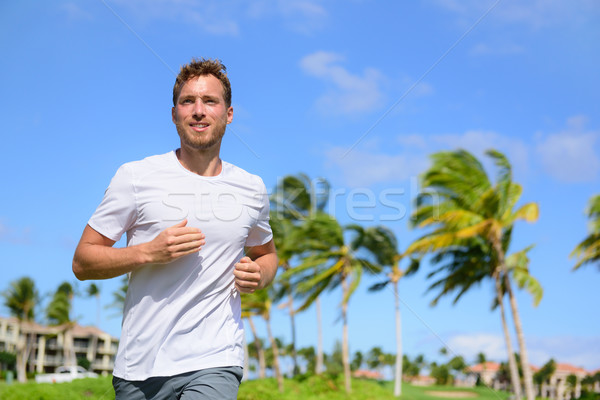 Saludable activo hombre corredor ejecutando tropicales Foto stock © Maridav