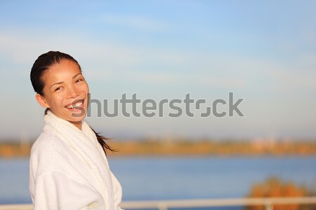 Estância termal recorrer mulher roupão de banho ao ar livre mulher sorrindo Foto stock © Maridav