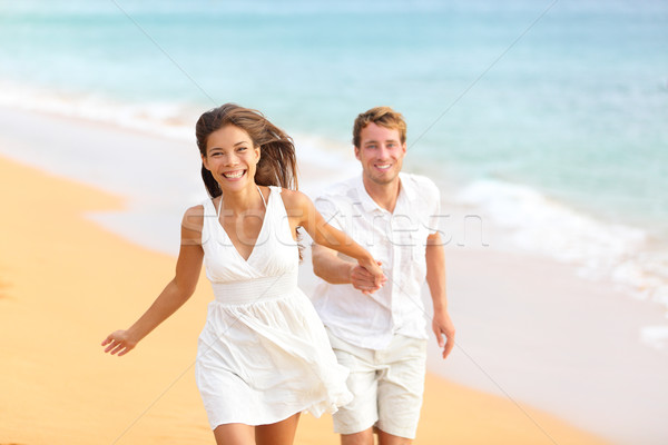 Сток-фото: пару · пляж · работает · смеясь · элегантный