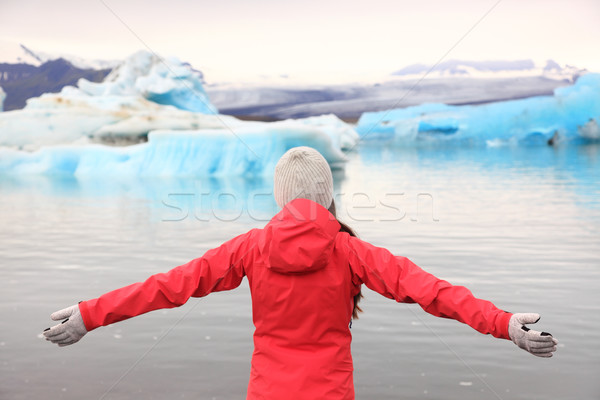 Freedom happy woman at glacier lagoon on Iceland Stock photo © Maridav