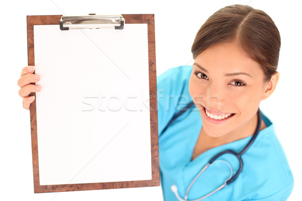 Nővér orvos mutat vágólap felirat orvosi Stock fotó © Maridav