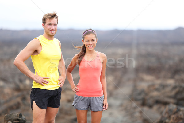 Portrait of runner couple resting after running Stock photo © Maridav