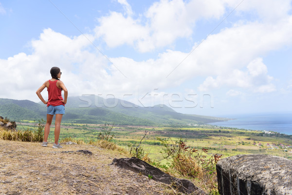 Hiking travel woman looking at St Kitts landscape Stock photo © Maridav