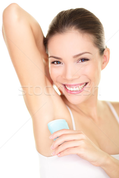 Deodorant - woman applying deodorant in armpit Stock photo © Maridav