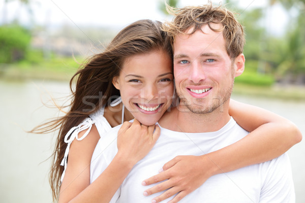 Young couple smiling happy portrait - interracial couple Stock photo © Maridav