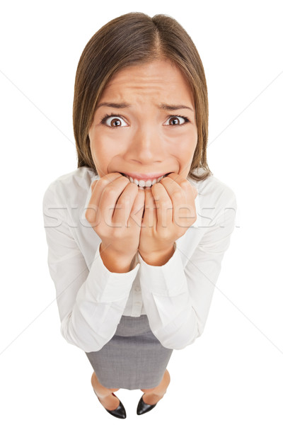 Frightened and stressed young business woman Stock photo © Maridav
