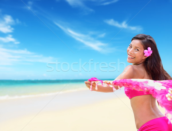 Happy carefree hawaiian woman relaxing on beach Stock photo © Maridav