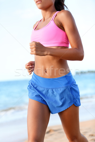 Courir femme coureur jogging plage [[stock_photo]] © Maridav