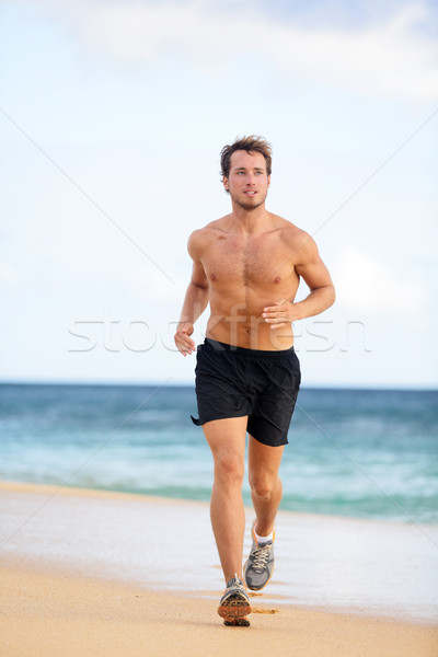 Beach fitness man runner running training cardio Stock photo © Maridav