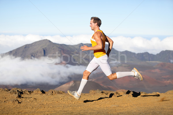 Runner man athlete running sprinting fast Stock photo © Maridav