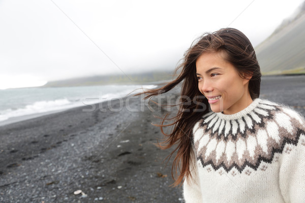 Beautiful woman walking on beach on Iceland Stock photo © Maridav