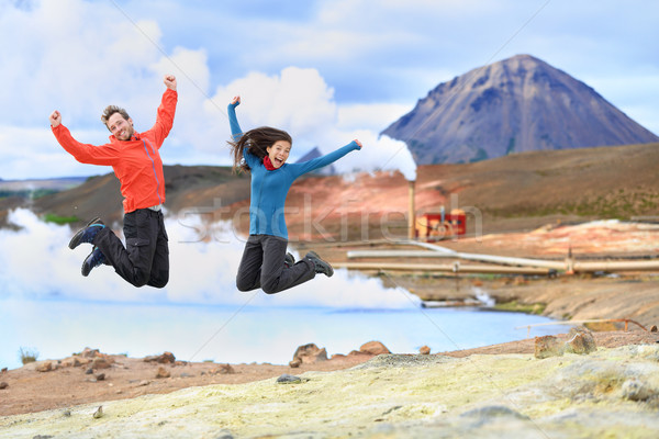 Iceland travel people jumping of joy in nature Stock photo © Maridav