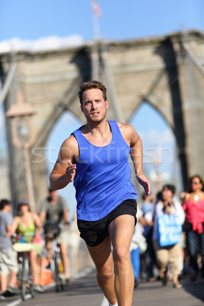 Running athlete training on Brooklyn bridge, NYC Stock photo © Maridav