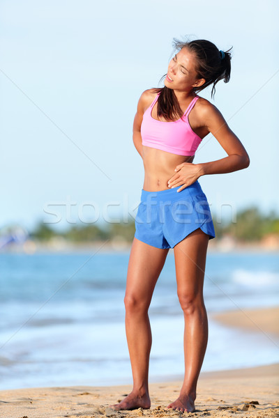 Lateral femeie alergător cusatura funcţionare jogging Imagine de stoc © Maridav
