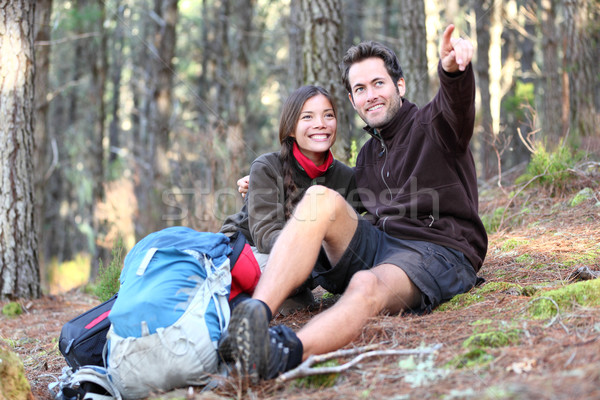 Fiatal boldog pár kirándulás erdő mosolyog Stock fotó © Maridav