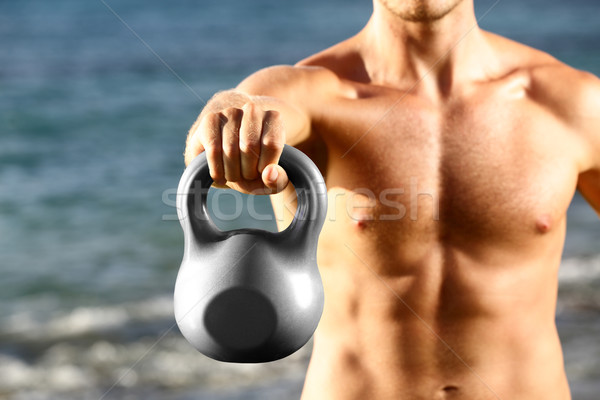 Crossfit fitnessz férfi képzés kettlebell közelkép Stock fotó © Maridav