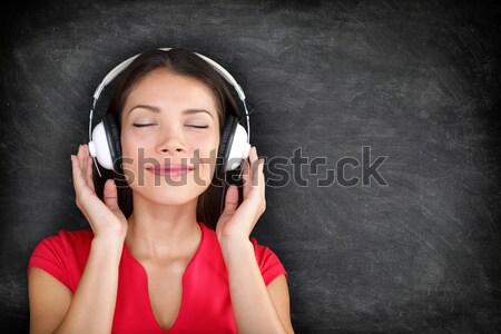 Música mujer auriculares escuchar música notas musicales Foto stock © Maridav