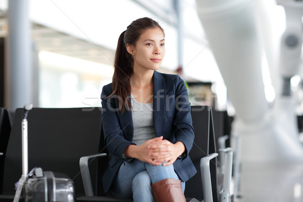 Airport woman waiting in terminal - air travel Stock photo © Maridav