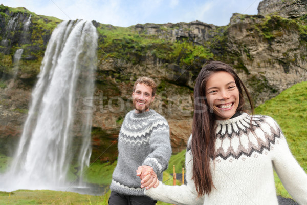 Iceland couple wearing Icelandic sweaters happy Stock photo © Maridav