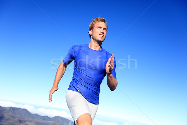 Stock photo: Athlete runner sprinting running to success