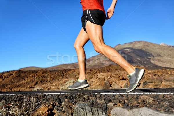 Running athlete man runner jogging on nature road Stock photo © Maridav