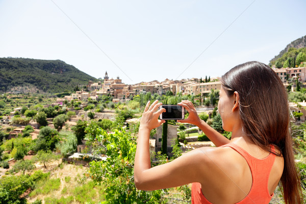 Tourist taking picture of Deia Village in Mallorca Stock photo © Maridav