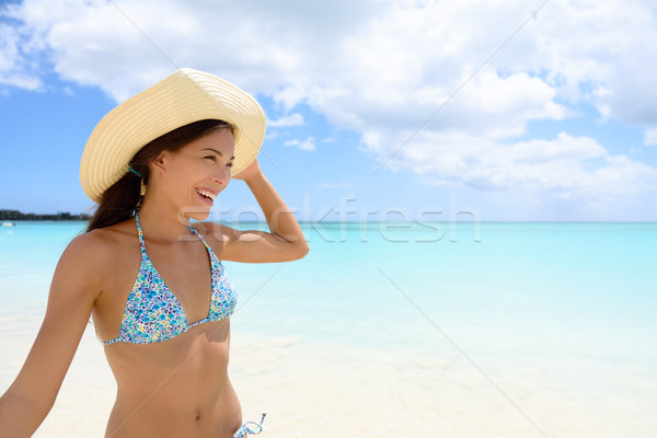 Woman in hat on the beach - girl having fun in sun Stock photo © Maridav