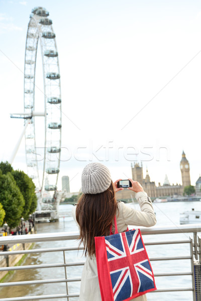 London Tourist taking picture of river Thames Stock photo © Maridav