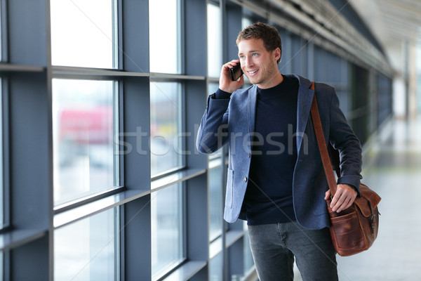 Man talking on phone in airport - travel lifestyle Stock photo © Maridav