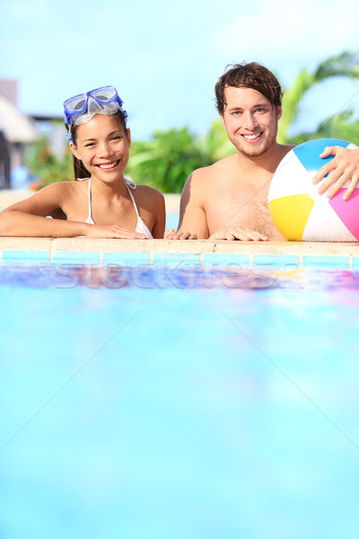 Holidays couple in pool Stock photo © Maridav