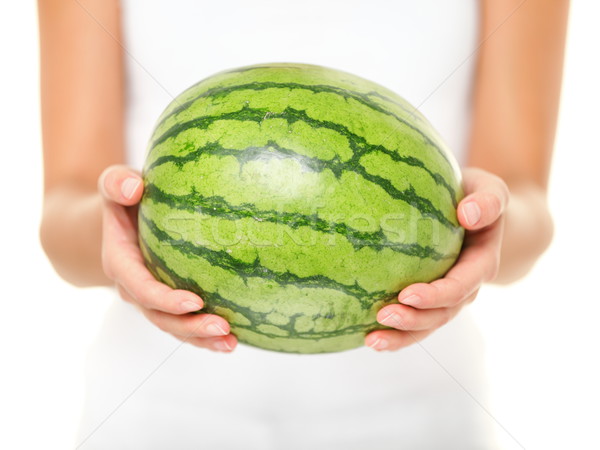 Stock photo: Watermelon - woman showing whole watermelon