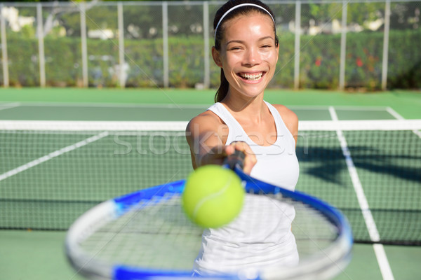 Tennis player - woman showing ball and racket Stock photo © Maridav