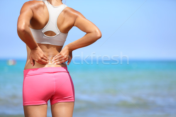 Stock foto: Rückenschmerzen · sportlich · Frau · zurück · rosa · Sportbekleidung