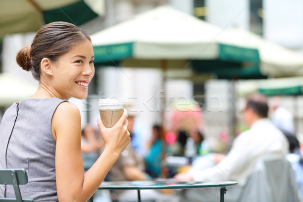 Young business woman coffee break in city park Stock photo © Maridav