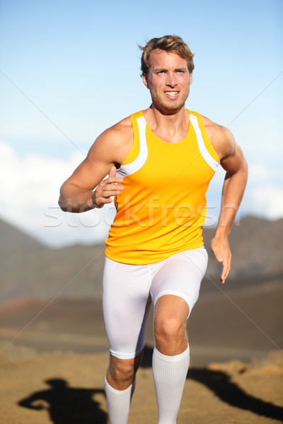 Sport fitness running man sprinting outside Stock photo © Maridav
