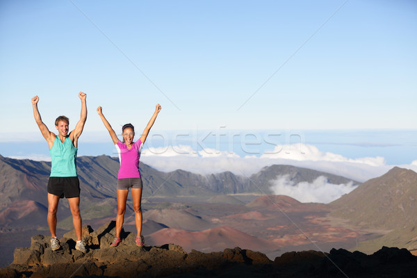 Happy cheering winning success outdoors couple Stock photo © Maridav