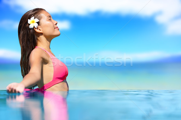 Stock photo: Spa vacation retreat woman relaxing at travel resort