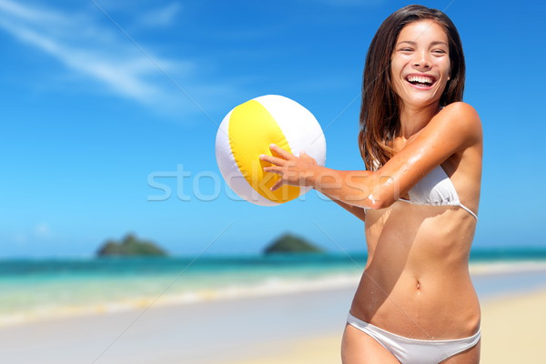 Beach fun summer vacation woman playing with ball Stock photo © Maridav