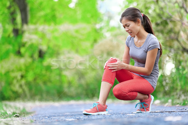 Knie letsel sport lopen verwondingen vrouw Stockfoto © Maridav
